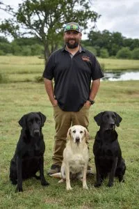 Cripple Creek Retrievers strives to achieve our client’s goals, whether that is a hunting companion or a Master National Qualifier.  Our staff enjoys assisting clients from puppy selection to teaching clients how to handle their newly trained retriever.  We take pride in providing the same care to client’s dogs as we would our own; a happy, healthy dog that loves to learn during the training process and bonds with our trainers and the dog owner to achieve their goals.

JC Strange-Owner and Head Trainer
JC has 20 years of experience training and handling retrievers professionaly. JC has excelled at every venue offered to retrievers.  JC’s main focus at Cripple Creek Retrievers is Advanced Training and Competition dogs while also overseeing all aspects of training from obedience to finished field work.

Abi Strange-Owner and Head Administrator
Abi is responsible for business side of the operation.  She handles the billing and scheduling for Cripple Creek Retrievers.  Abi is also in charge of the Whelping Service where she handles puppy whelping and finding the perfect home for each puppy.
 
 

Garrett Davis- Foundation & Competetive Trainer
Garrett joined CCR in 2025 and brings 5 years of dog training experience with him. As our foundation trainer he focuses on building the skills, confidence, and consistency that dogs need before moving into more advance work. He also works with both gun dogs and competiton dogs, helping develop everything from dependable hunting partners to dogs preparing to step to the line at hunt tests.
Cripple Creek Retrievers Proudly Uses and Endorses the Following Products: