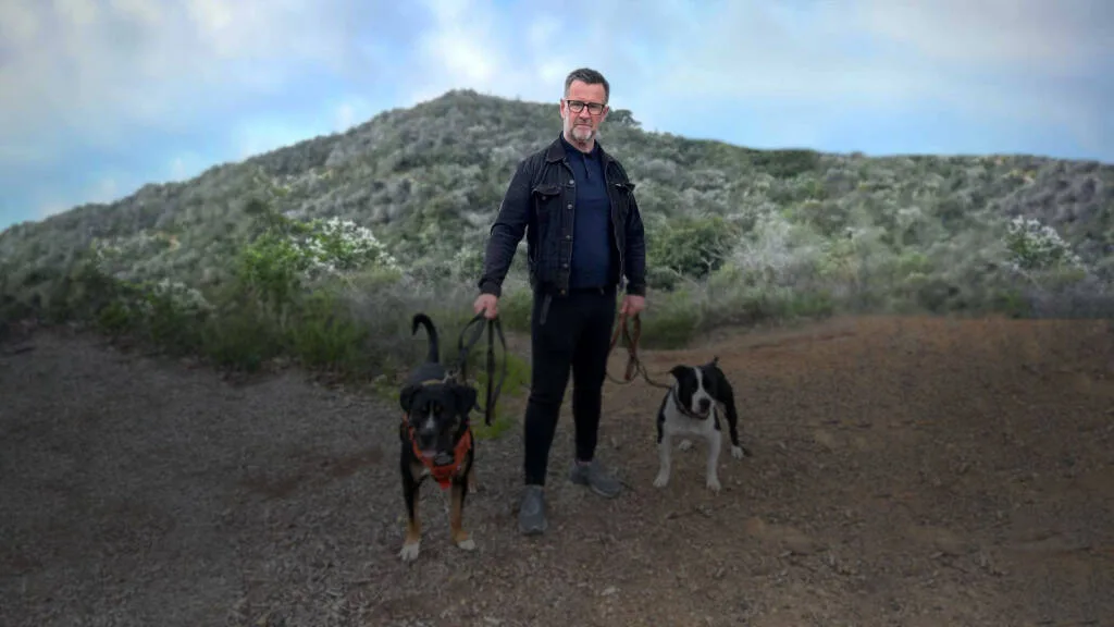 Gordon Webster with two dogs.