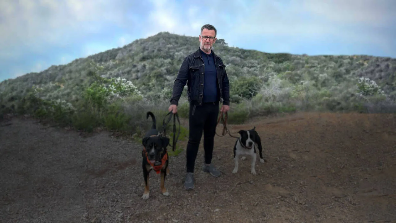 Gordon Webster with two dogs.