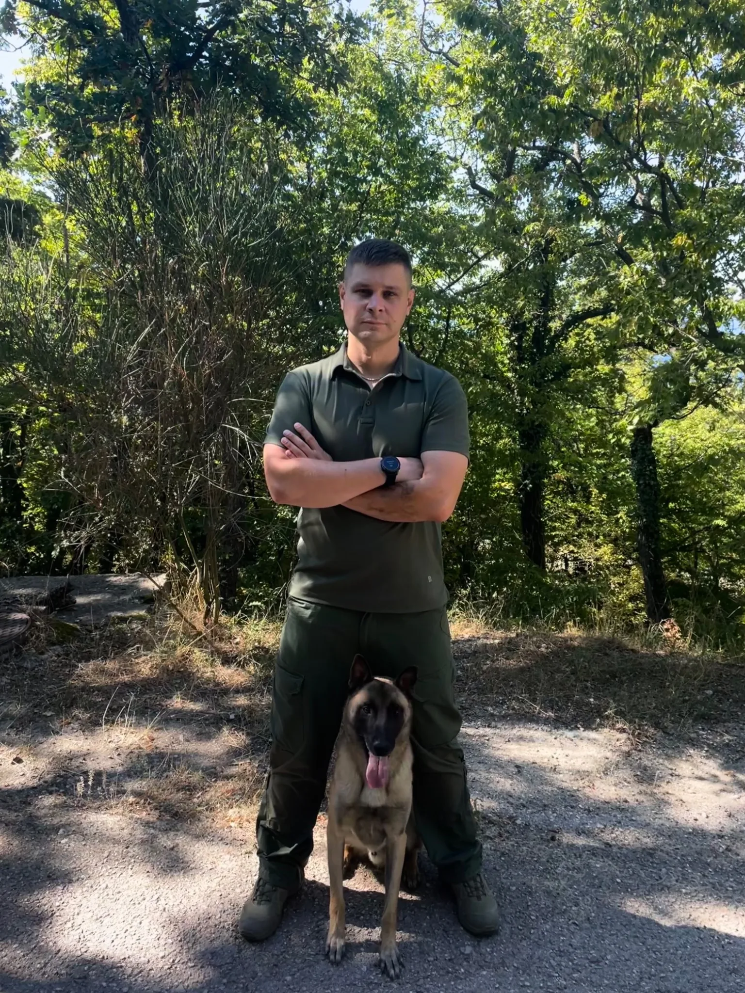 Vitalii Brizhatyi with dog